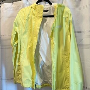Bright yellow north face rain coat